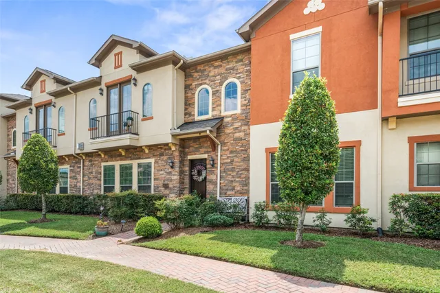 an aerial view of a city with lots of residential buildings