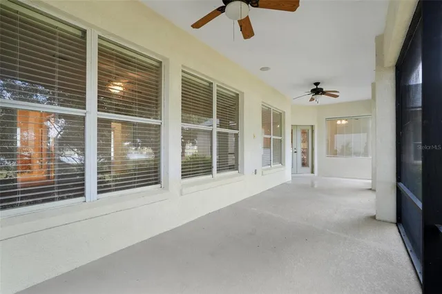 an aerial view of ocean with residential house with outdoor space and lake view