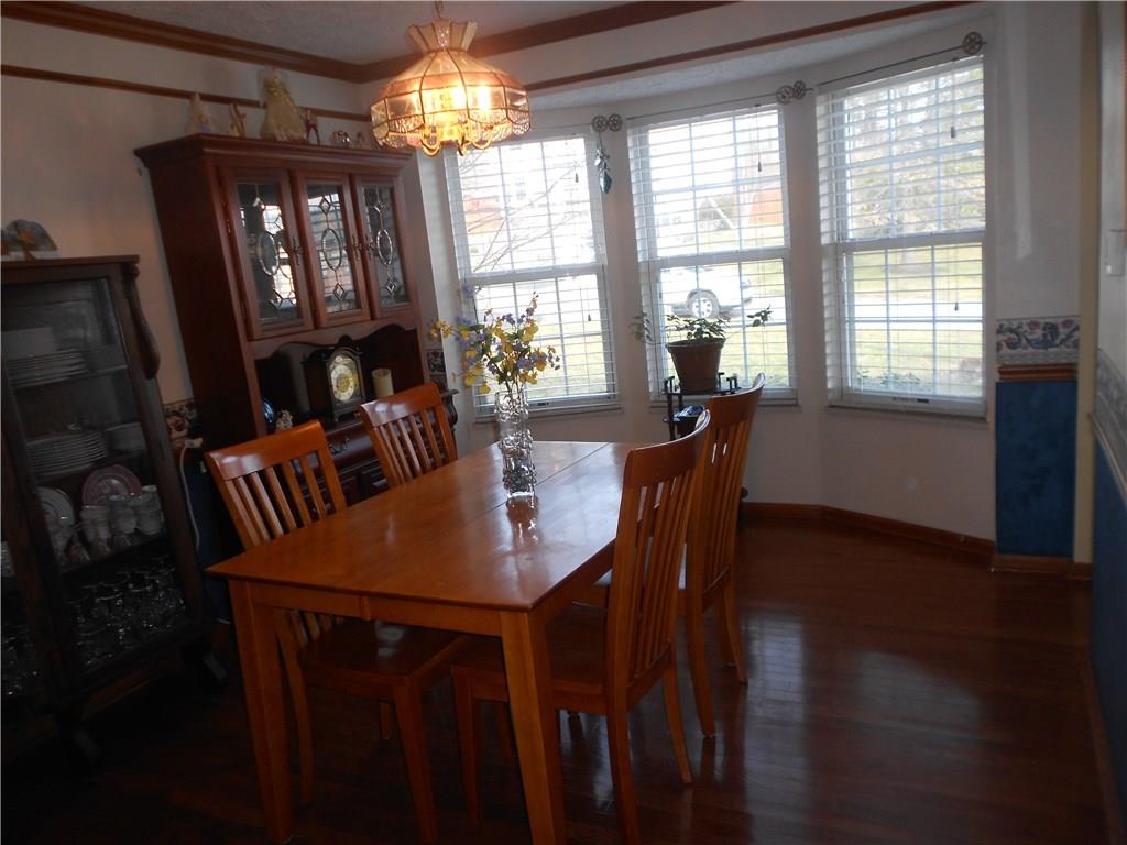 3575 Huntertown Road Allison Park, PA 15101 - Photo 3 of 22 DINING ROOM WITH HARDWOOD FLOORING, BOW WINDOW AND BUILT-IN CHINA CLOSET