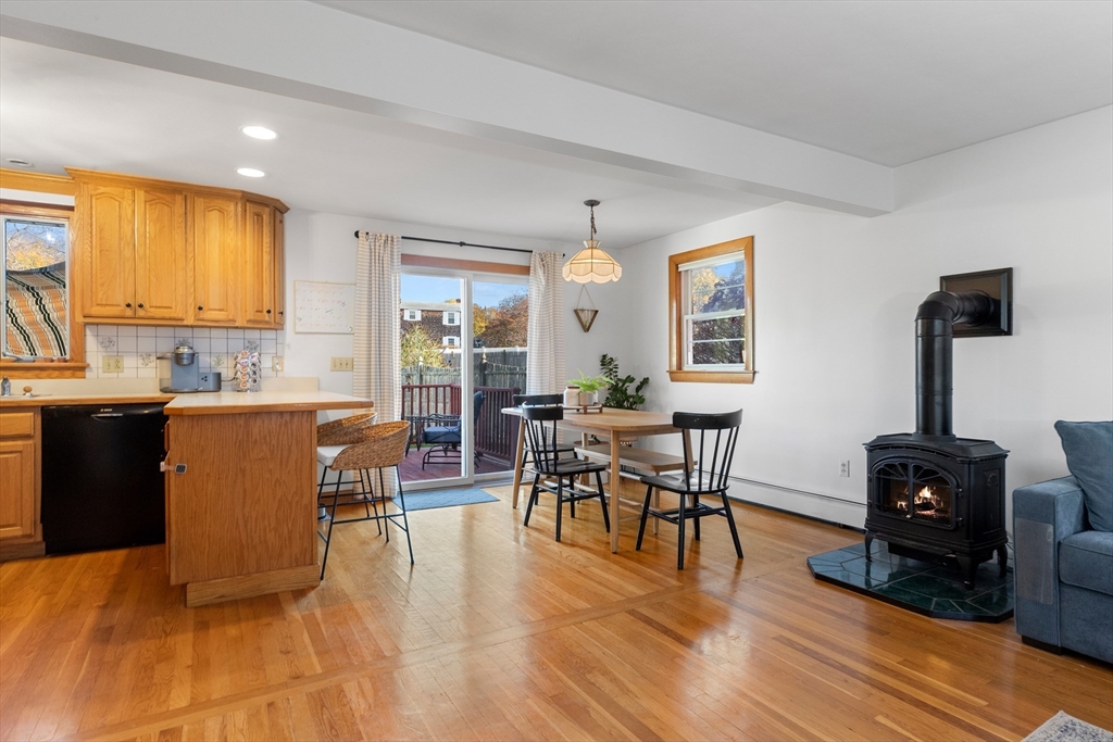 6 Auburn Road Salem, MA 01970 - Photo 12 of 32 a living room with furniture a wooden floor and a window