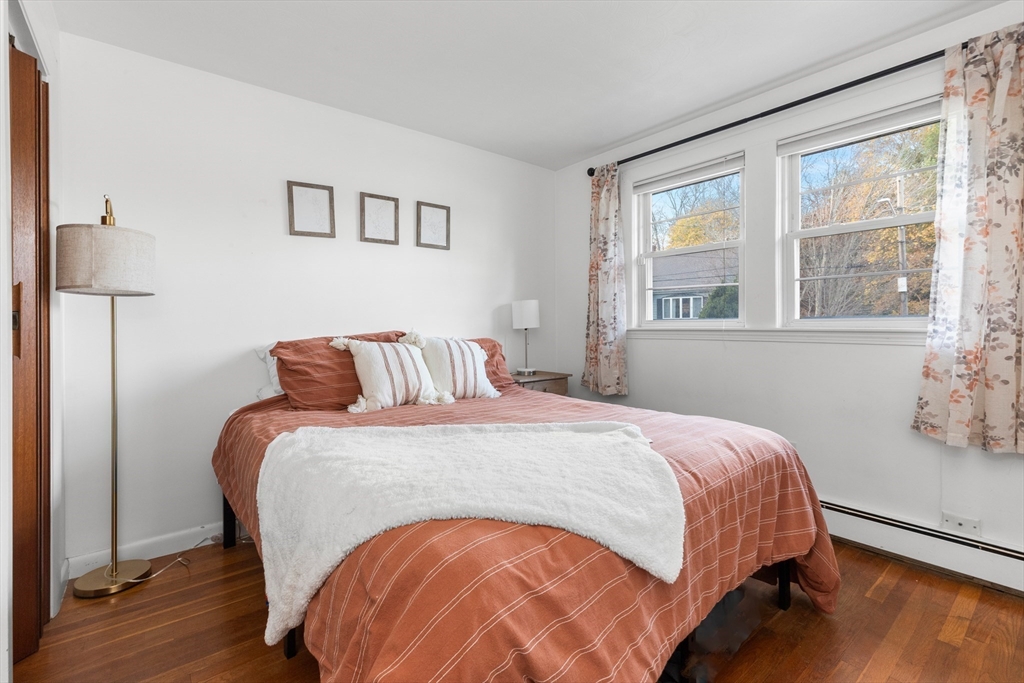 6 Auburn Road Salem, MA 01970 - Photo 18 of 32 a bedroom with a bed and wooden floor