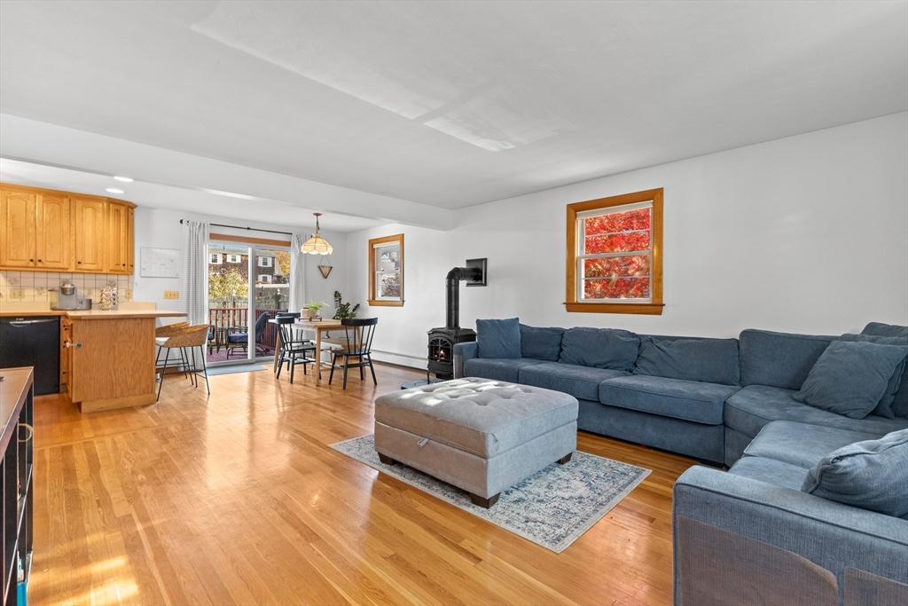 6 Auburn Road Salem, MA 01970 - Photo 6 of 32 a living room with furniture wooden floor and a window