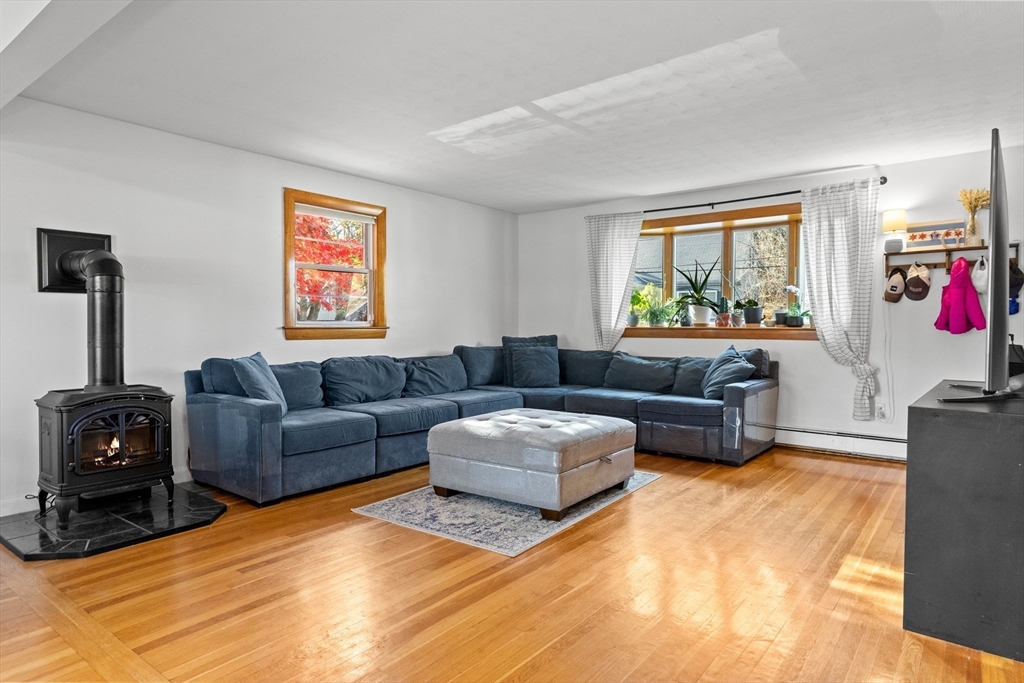 6 Auburn Road Salem, MA 01970 - Photo 7 of 32 a living room with furniture and a flat screen tv