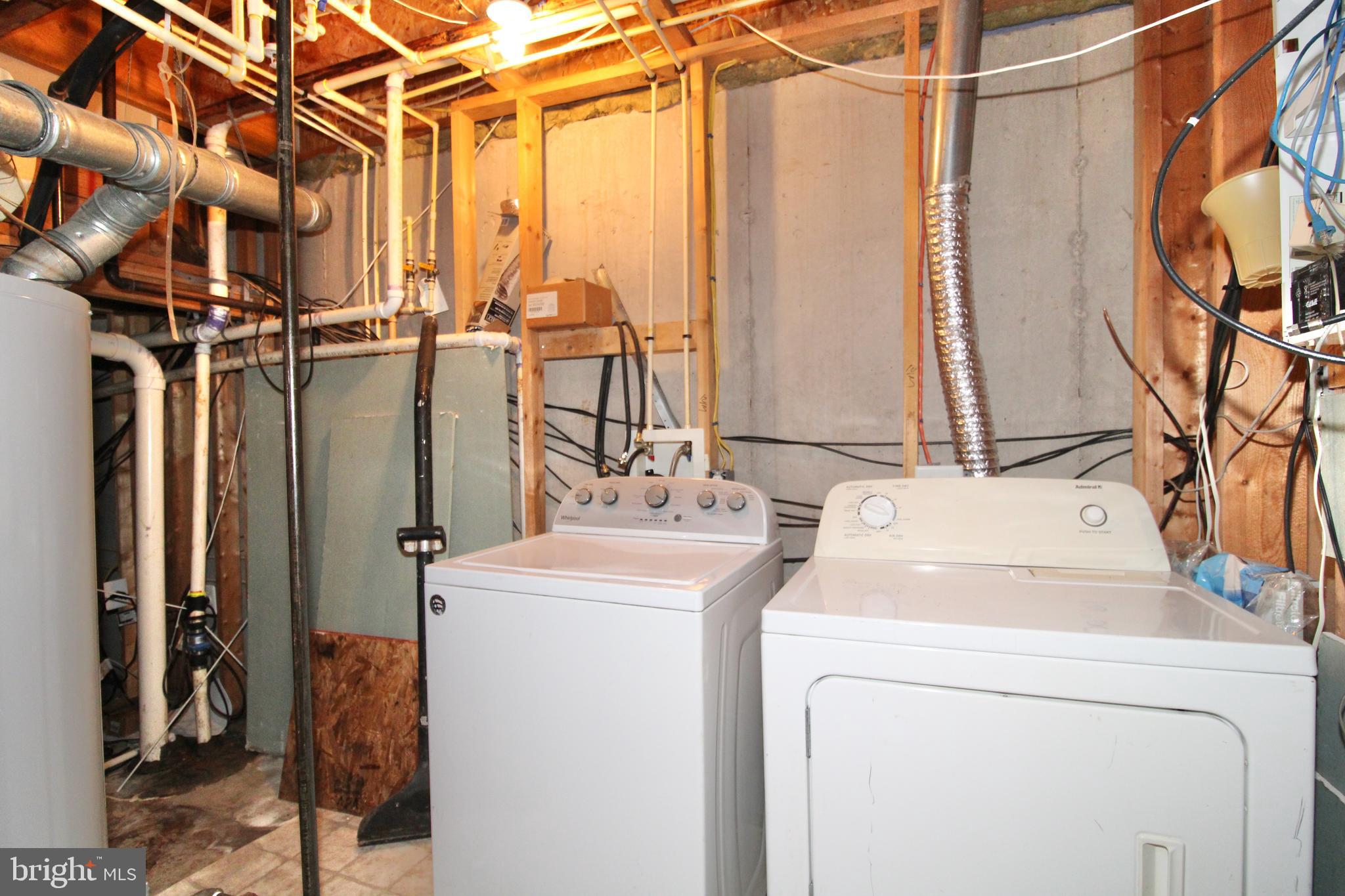 17628 Basalt Way Hagerstown, MD 21740 - Photo 11 of 20 a utility room with dryer and washer