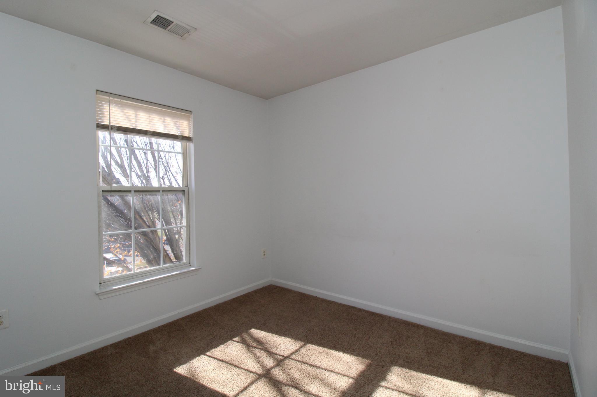 17628 Basalt Way Hagerstown, MD 21740 - Photo 17 of 20 an empty room with windows