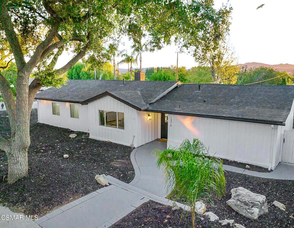 1376 East Avenida De Los Arboles Thousand Oaks, CA 91360 - Photo 1 of 1 a front view of a house with garden
