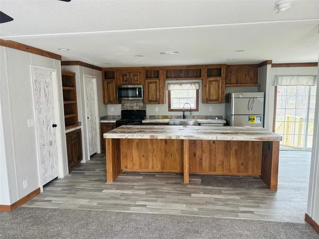 a bedroom with a bed and a closet