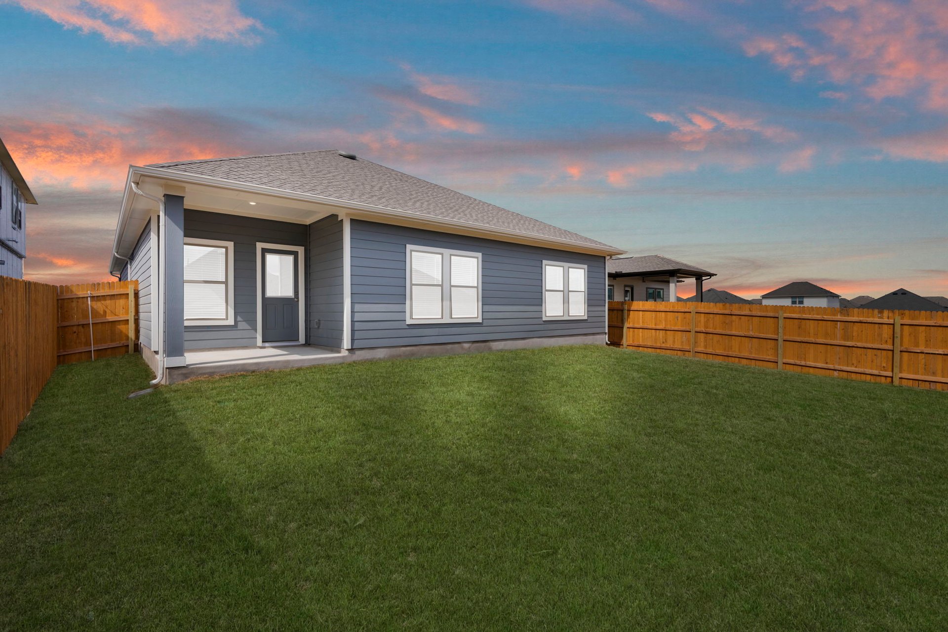 176 Wind Hill Jarrell, TX 76537 - Photo 28 of 31 Rear of Home and Private Backyard