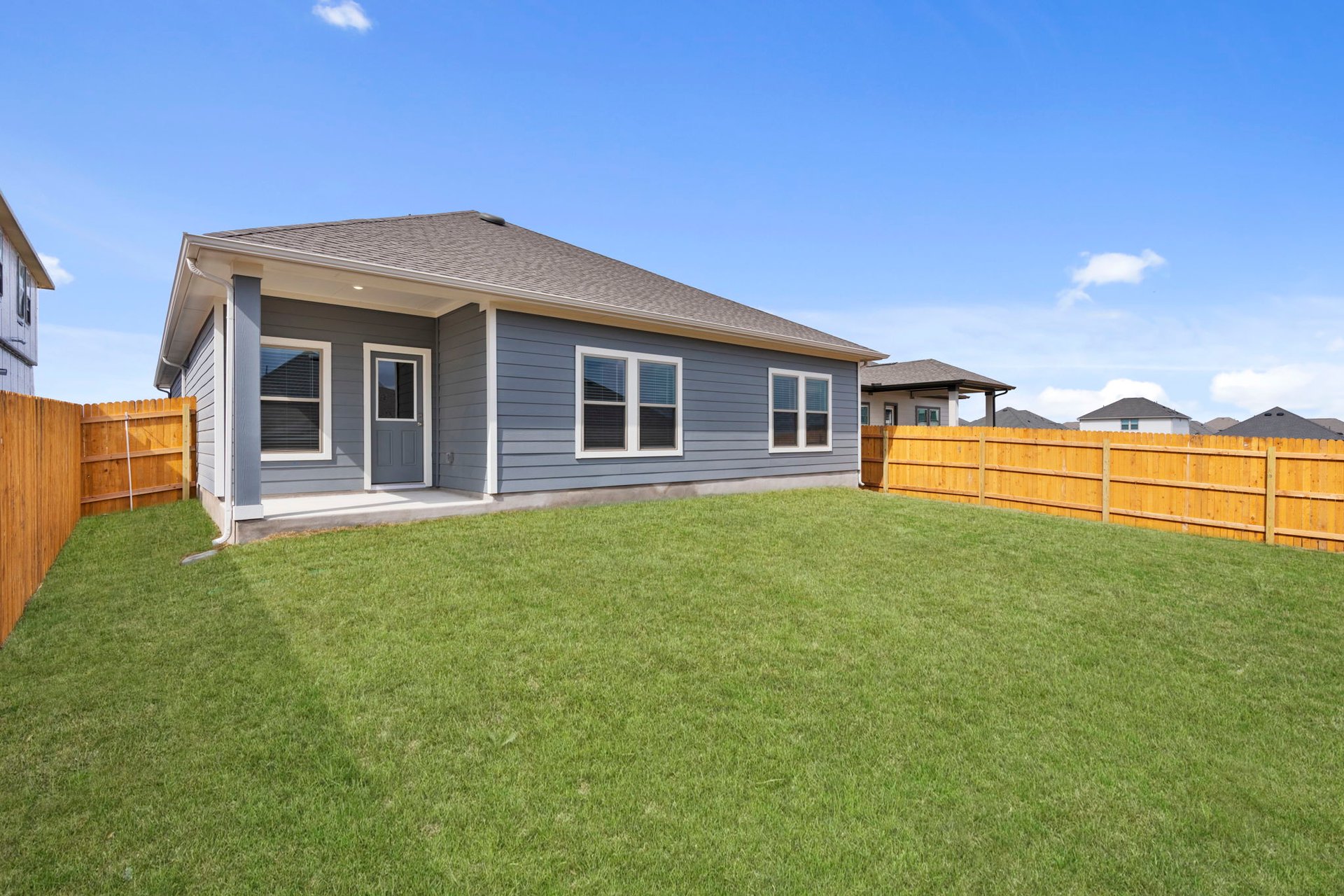 176 Wind Hill Jarrell, TX 76537 - Photo 30 of 31 Rear of Home and Private Backyard