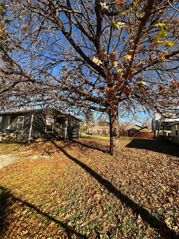 3346 Parvia Avenue Dallas, TX 75212 - Photo 4 of 5 a street view with large trees