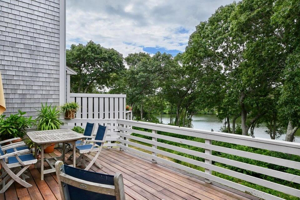 38 Landfall, Unit 38 Falmouth, MA 02540 - Photo 14 of 17 a view of a bench in a patio