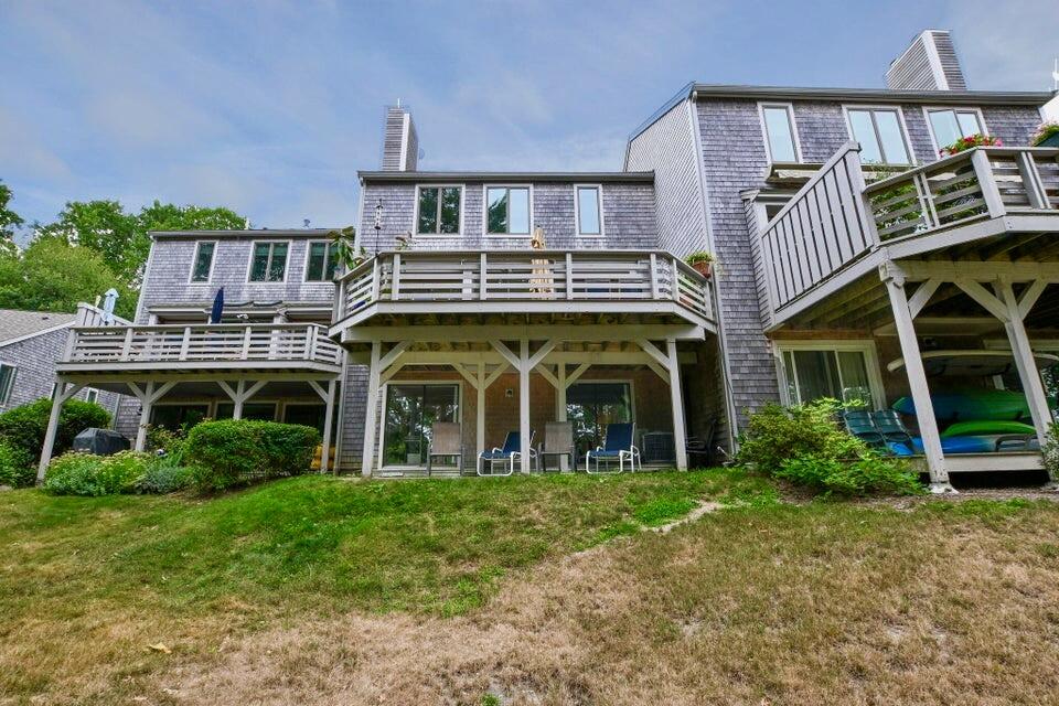 38 Landfall, Unit 38 Falmouth, MA 02540 - Photo 17 of 17 front view of a building with a garden