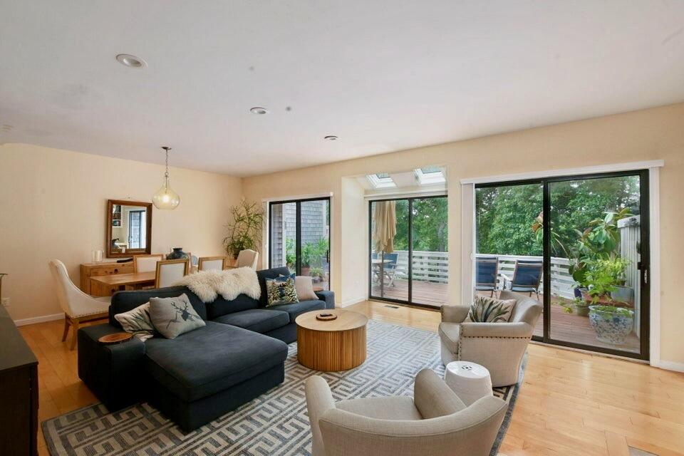 38 Landfall, Unit 38 Falmouth, MA 02540 - Photo 5 of 17 a living room with furniture and a large window