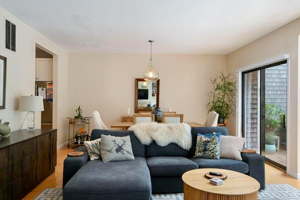38 Landfall, Unit 38 Falmouth, MA 02540 - Photo 6 of 17 a living room with furniture and a large window