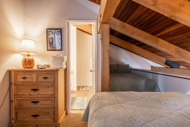 a view of bedroom with a bed