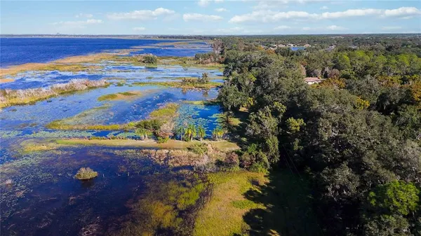 a view of a city with an ocean