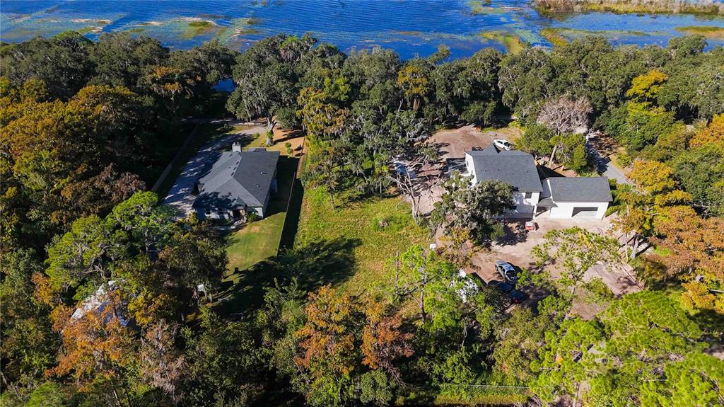 0 Lillian Black Road St. Cloud, FL 34771 - Photo 13 of 15 an aerial view of residential houses with outdoor space and trees