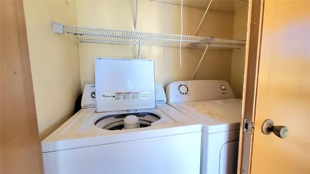 a view of a porch with wooden floor