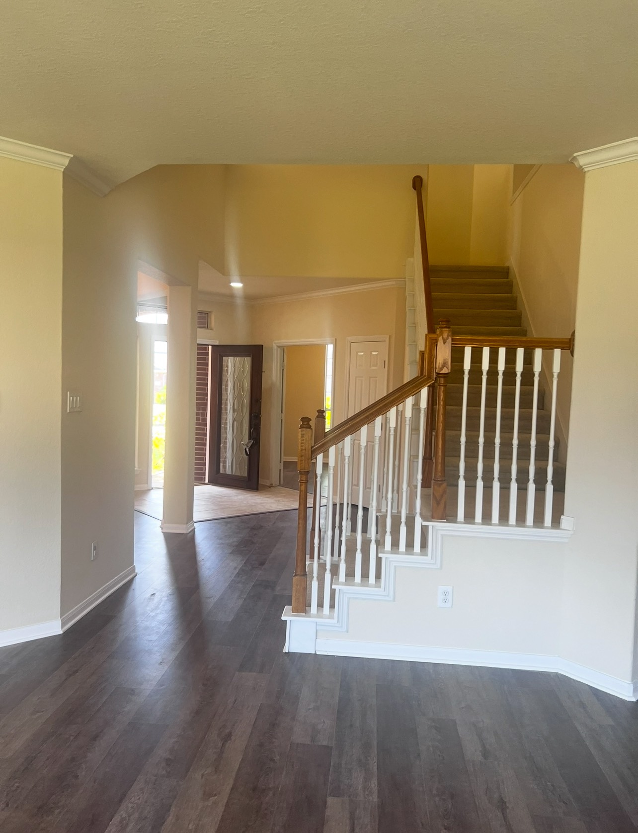 8411 Spotslyvania Lane Houston, TX 77083 - Photo 5 of 8 a view of a hallway with wooden floor