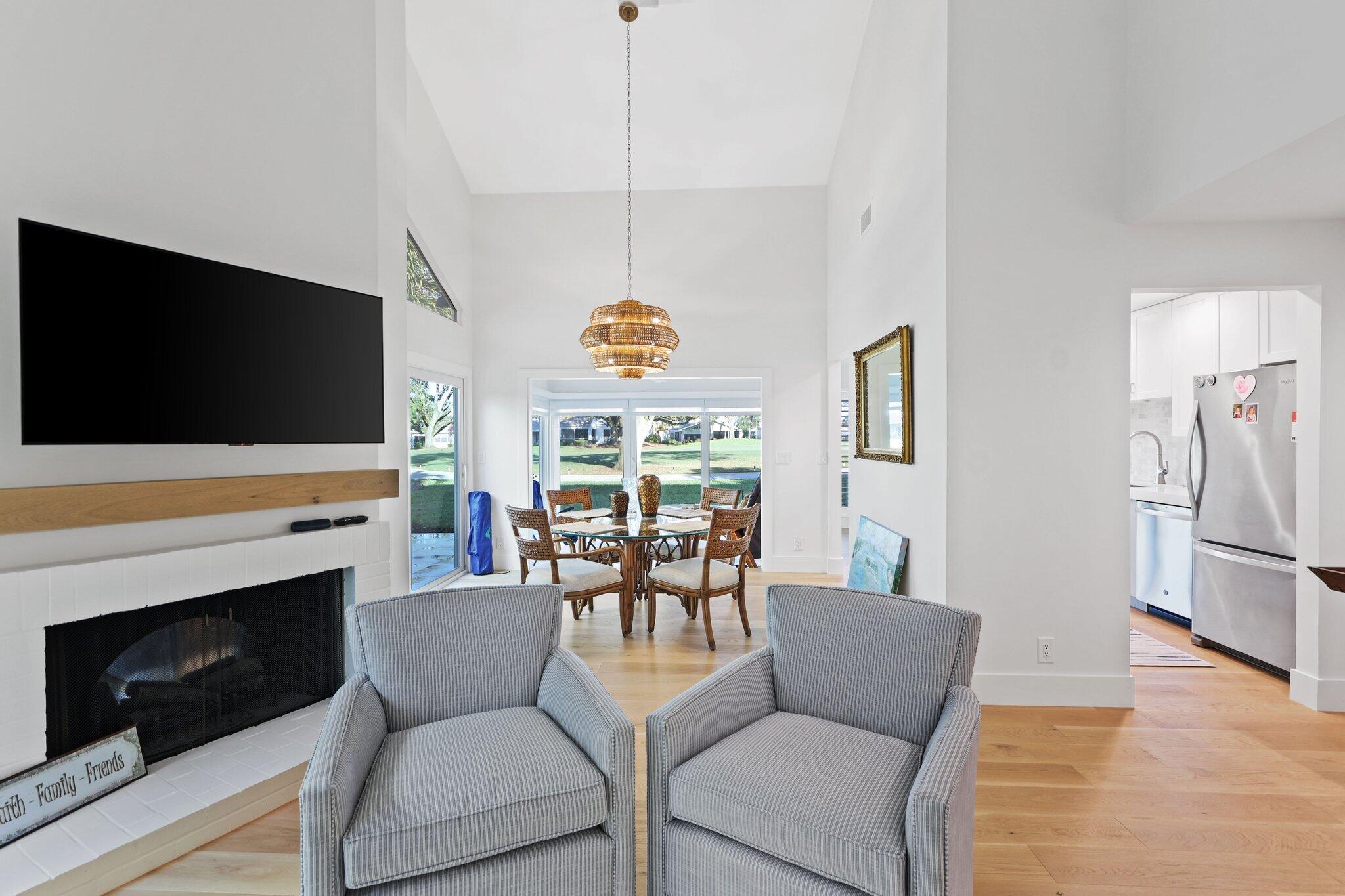 17012 Traverse Circle Jupiter, FL 33477 - Photo 13 of 33 a living room with furniture fireplace and flat screen tv