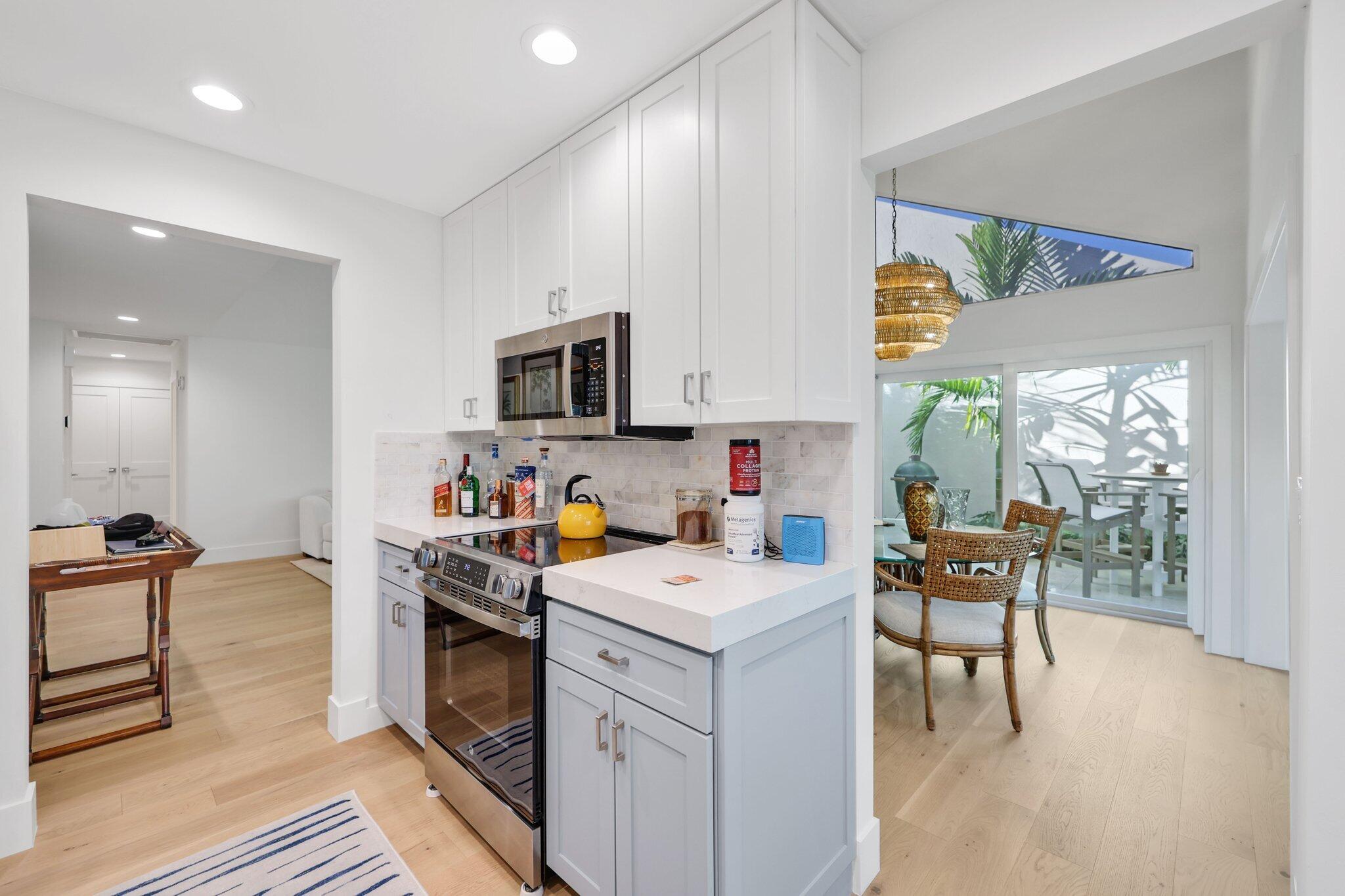 17012 Traverse Circle Jupiter, FL 33477 - Photo 15 of 33 a view of a kitchen with workspace and a window