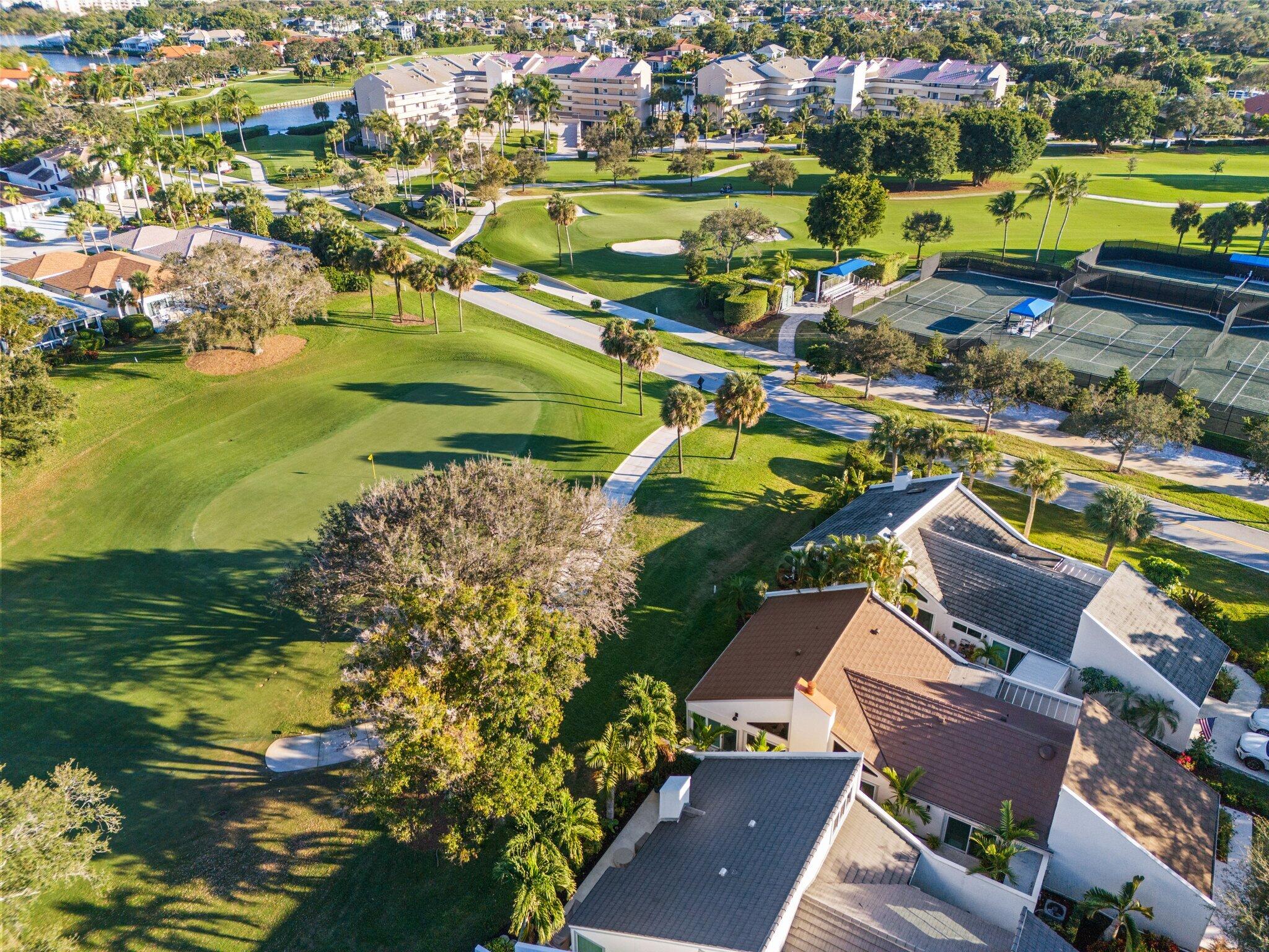 17012 Traverse Circle Jupiter, FL 33477 - Photo 2 of 33 an aerial view of residential houses with outdoor space