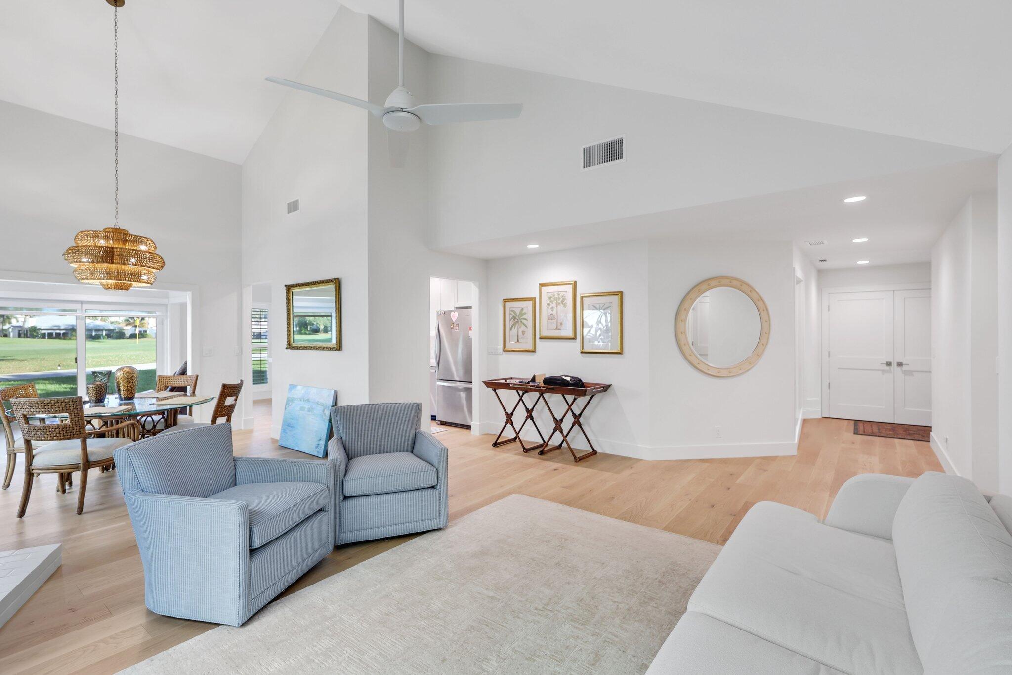 17012 Traverse Circle Jupiter, FL 33477 - Photo 8 of 33 a living room with furniture kitchen view and a large window