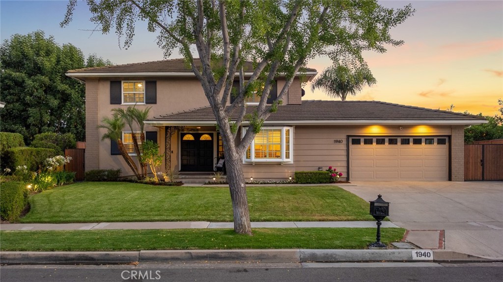1940 Sunset Lane Fullerton, CA 92833 - Photo 1 of 50 a front view of a house with a yard