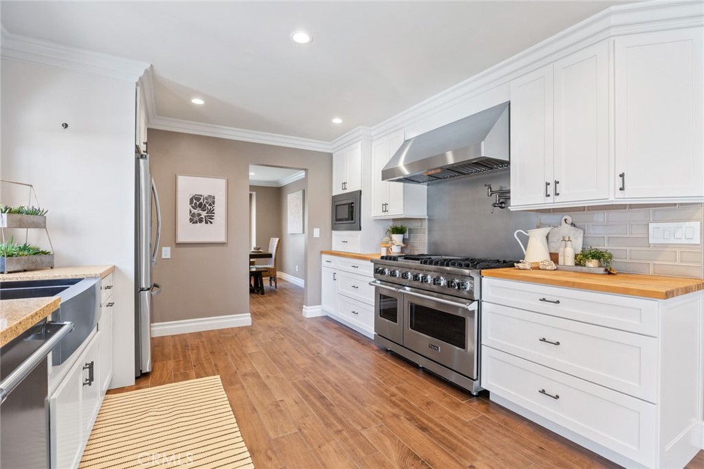 1940 Sunset Lane Fullerton, CA 92833 - Photo 12 of 50 a kitchen with a stove oven and sink