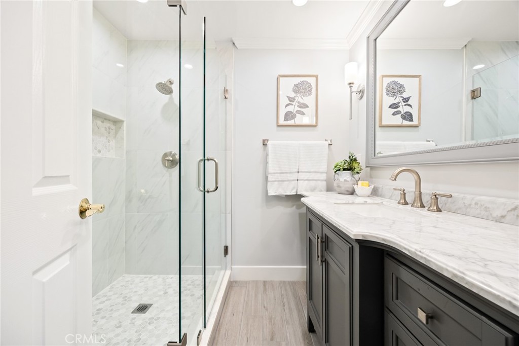 1940 Sunset Lane Fullerton, CA 92833 - Photo 25 of 50 a bathroom with a granite countertop sink mirror and shower