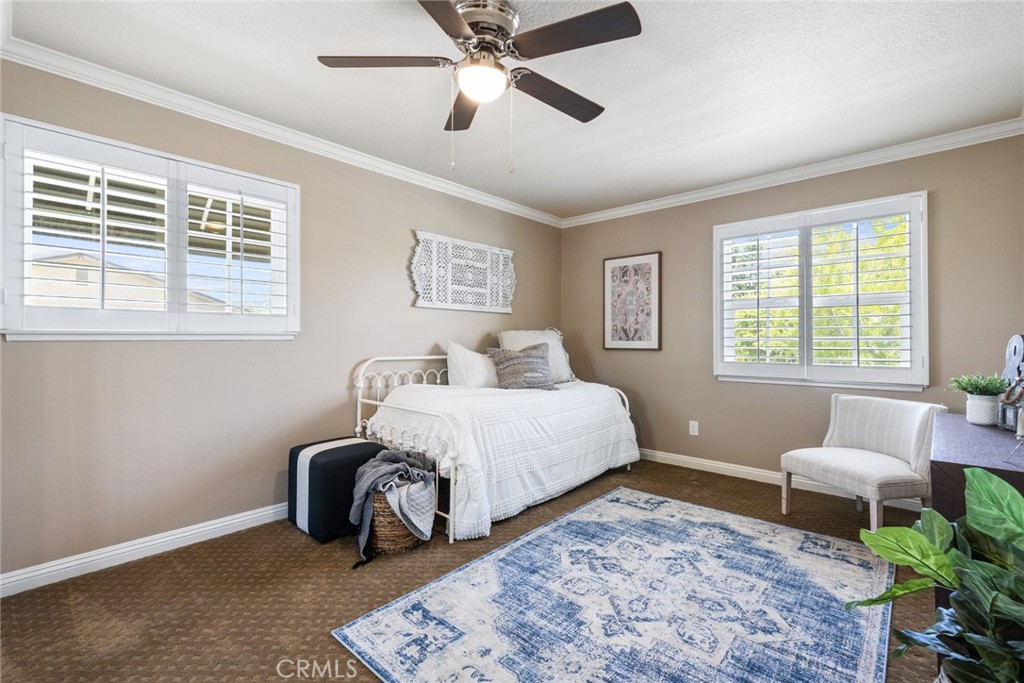 1940 Sunset Lane Fullerton, CA 92833 - Photo 28 of 50 a bedroom with a bed and a couch