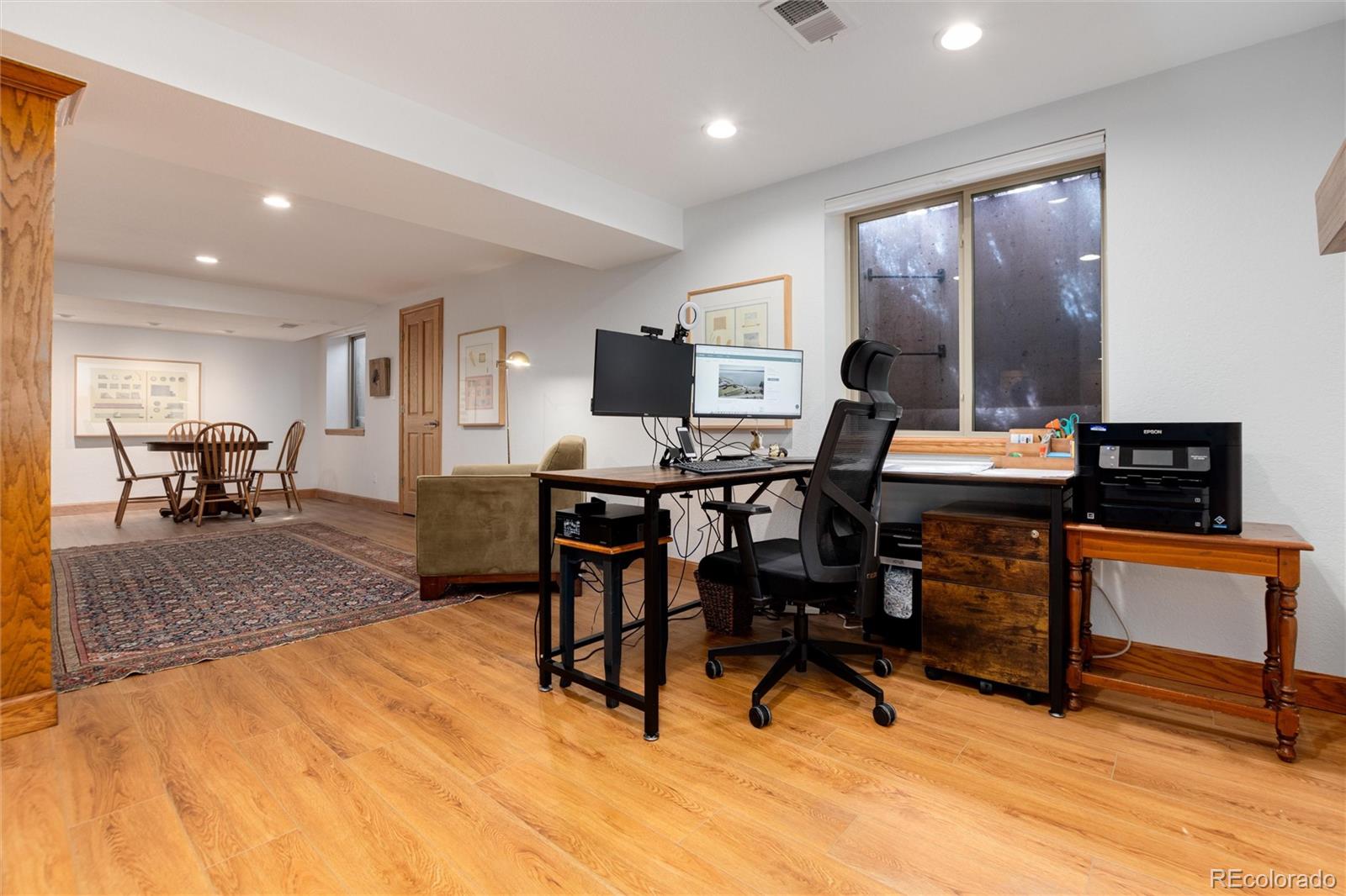 65 North Ranch Road Littleton, CO 80127 - Photo 26 of 44 a view of a workspace with furniture