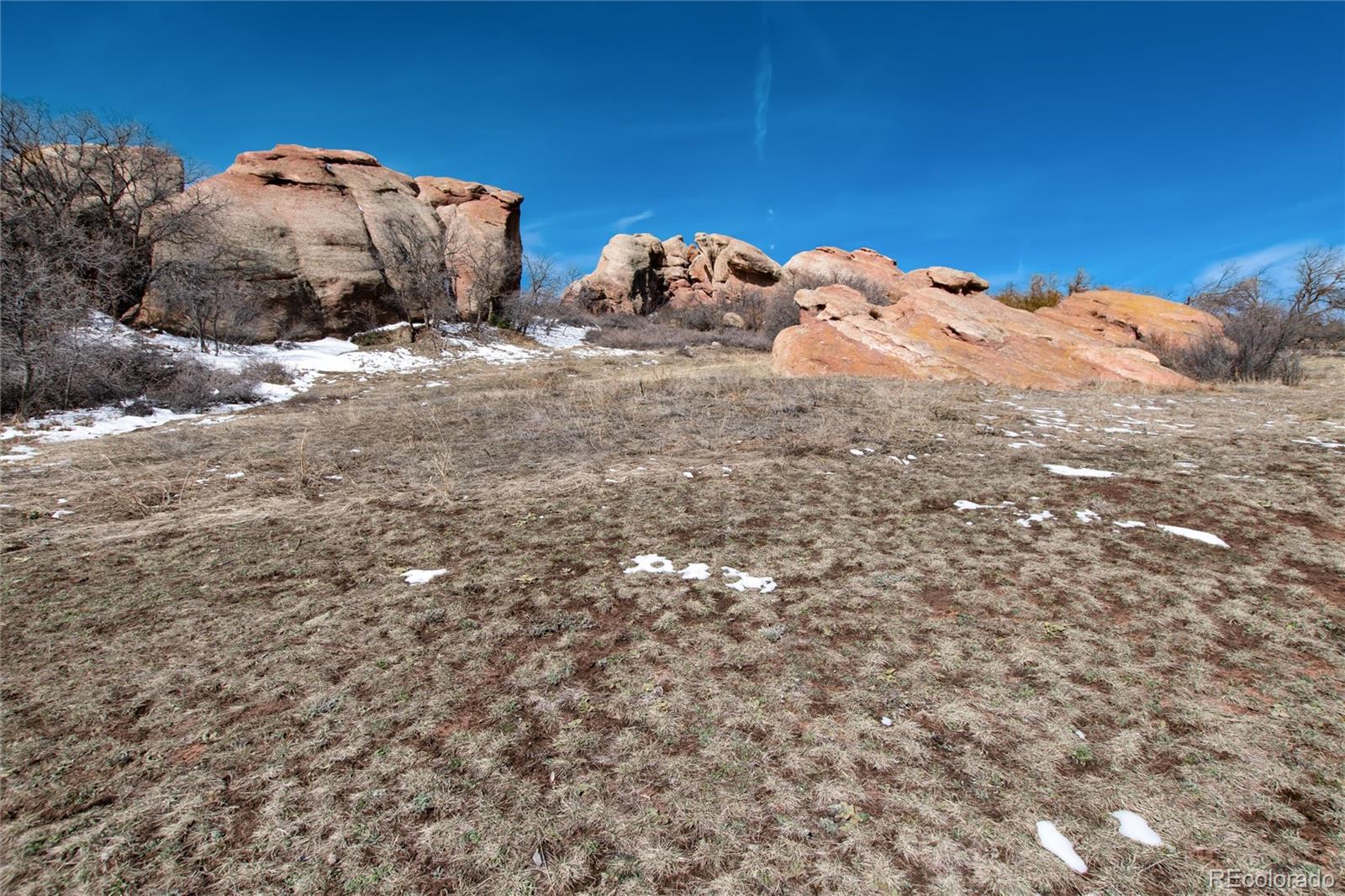 65 North Ranch Road Littleton, CO 80127 - Photo 33 of 44 a view of a backyard of the house
