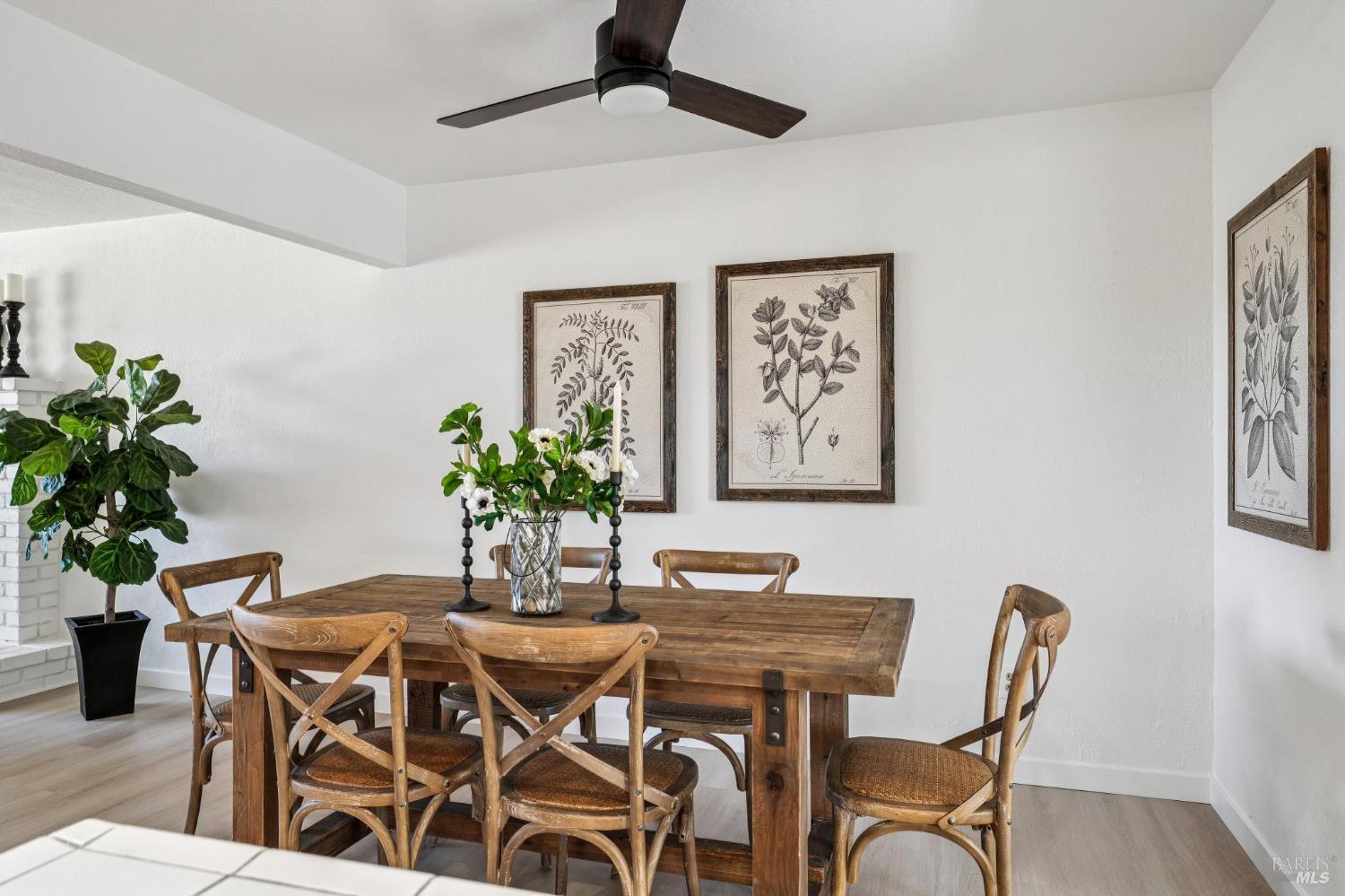 2295 Francisco Avenue, Unit 1 Santa Rosa, CA 95403 - Photo 15 of 65 a dining room with furniture and potted plants