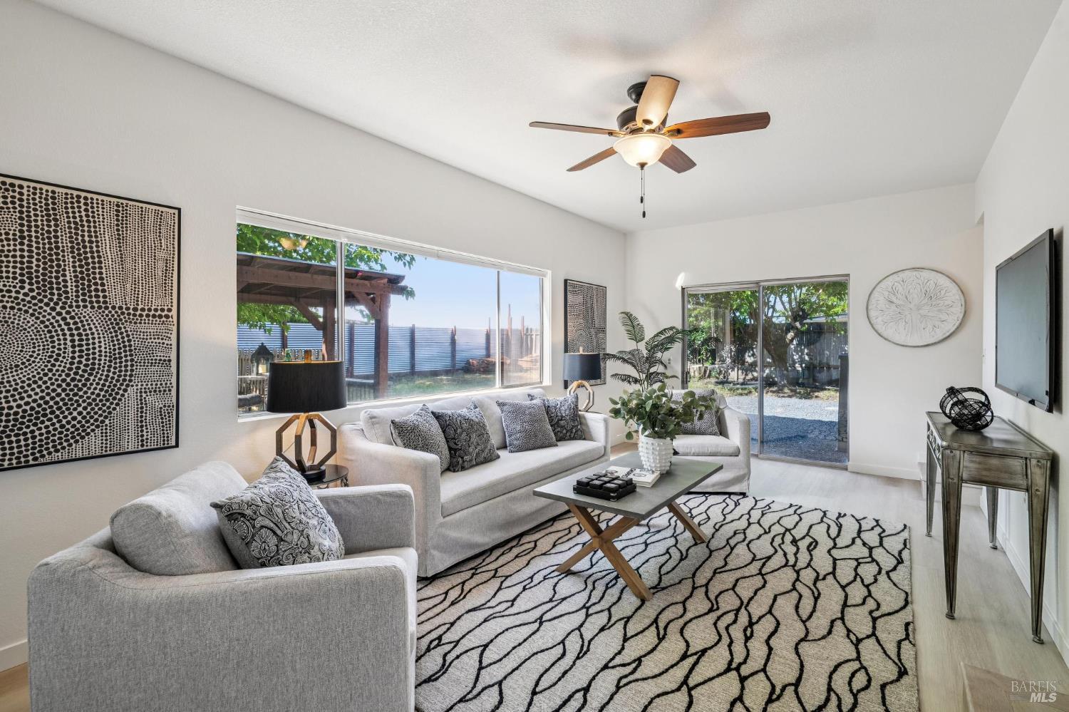 2295 Francisco Avenue, Unit 1 Santa Rosa, CA 95403 - Photo 20 of 65 a living room with furniture and a large window