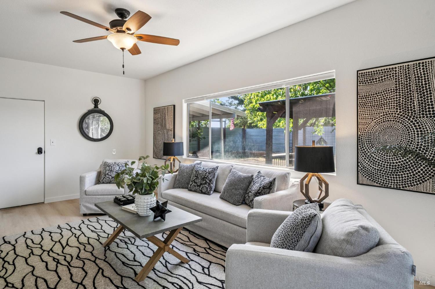 2295 Francisco Avenue, Unit 1 Santa Rosa, CA 95403 - Photo 21 of 65 a living room with furniture and a large window