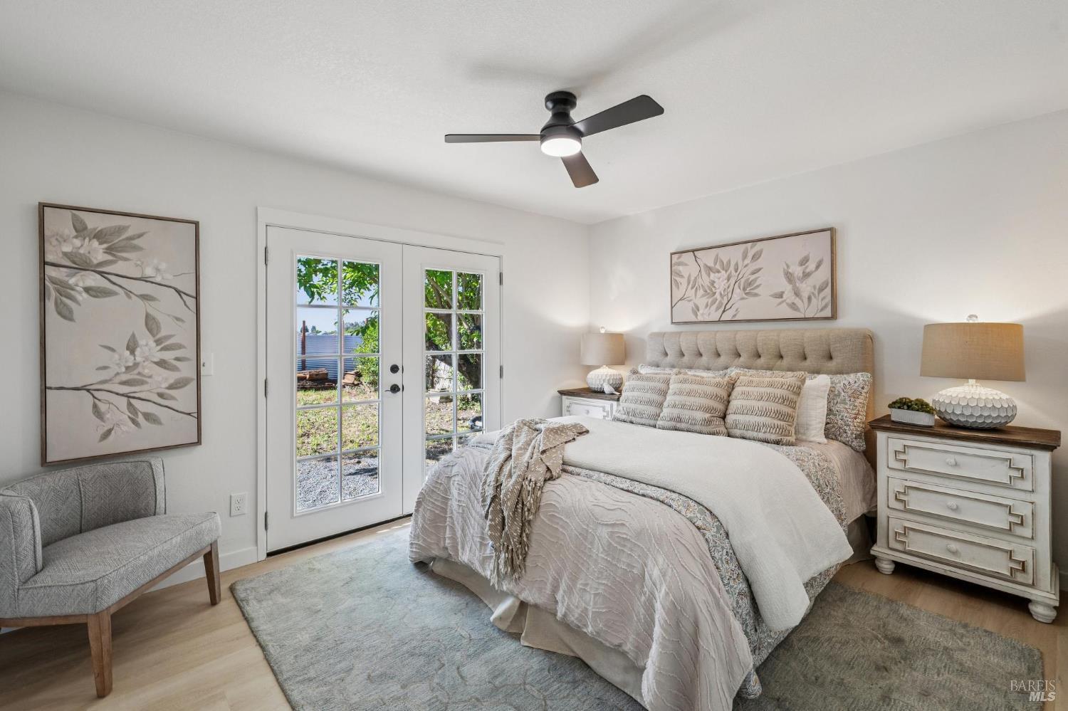 2295 Francisco Avenue, Unit 1 Santa Rosa, CA 95403 - Photo 23 of 65 a bedroom with a bed and a couch