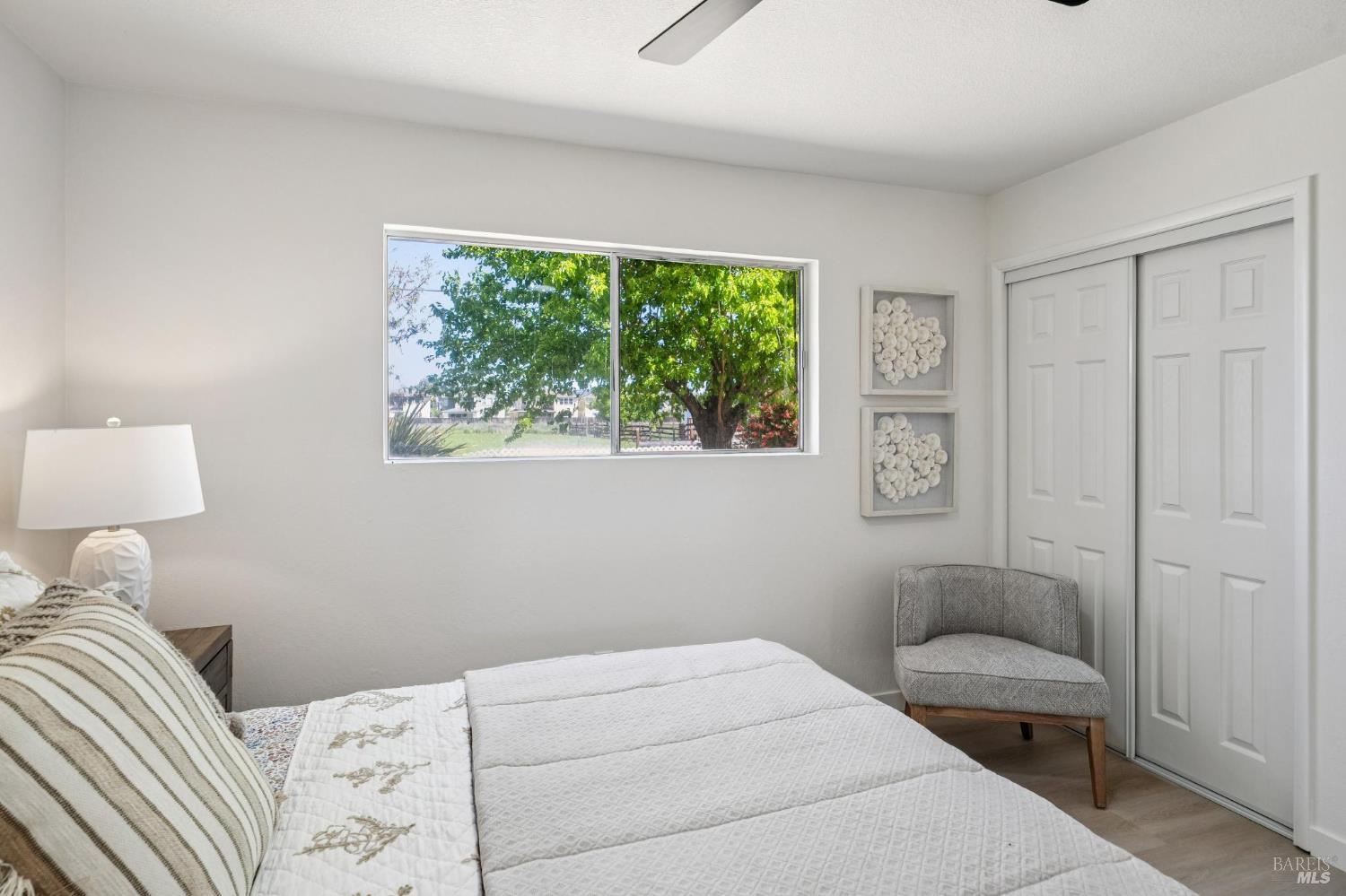 2295 Francisco Avenue, Unit 1 Santa Rosa, CA 95403 - Photo 33 of 65 a bedroom with a bed and a window