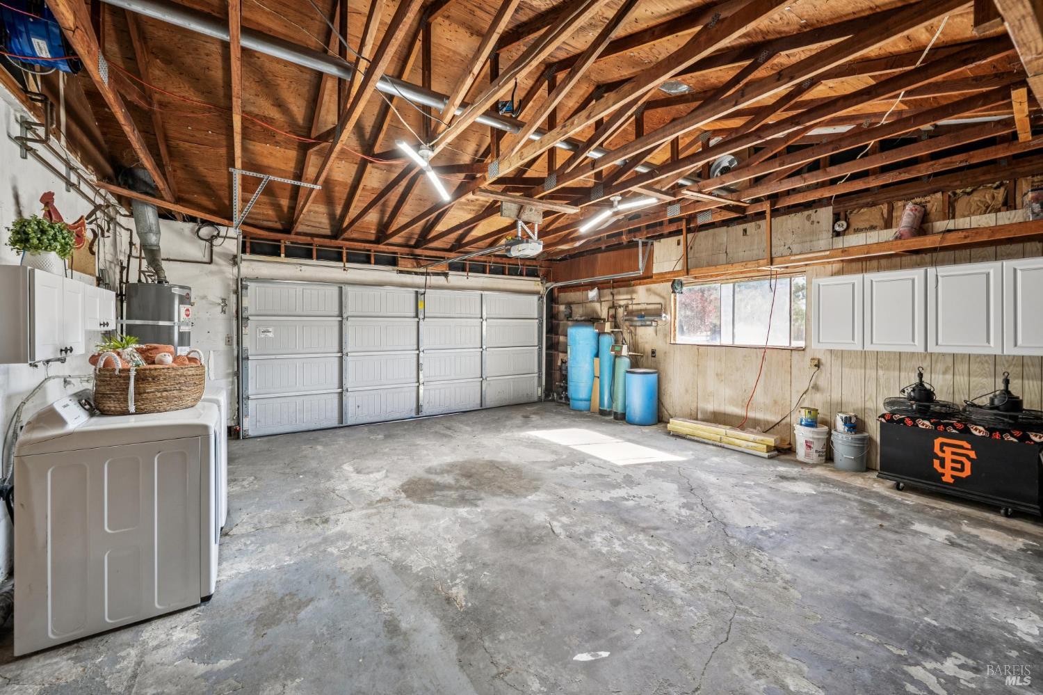 2295 Francisco Avenue, Unit 1 Santa Rosa, CA 95403 - Photo 36 of 65 a view of a garage with furniture