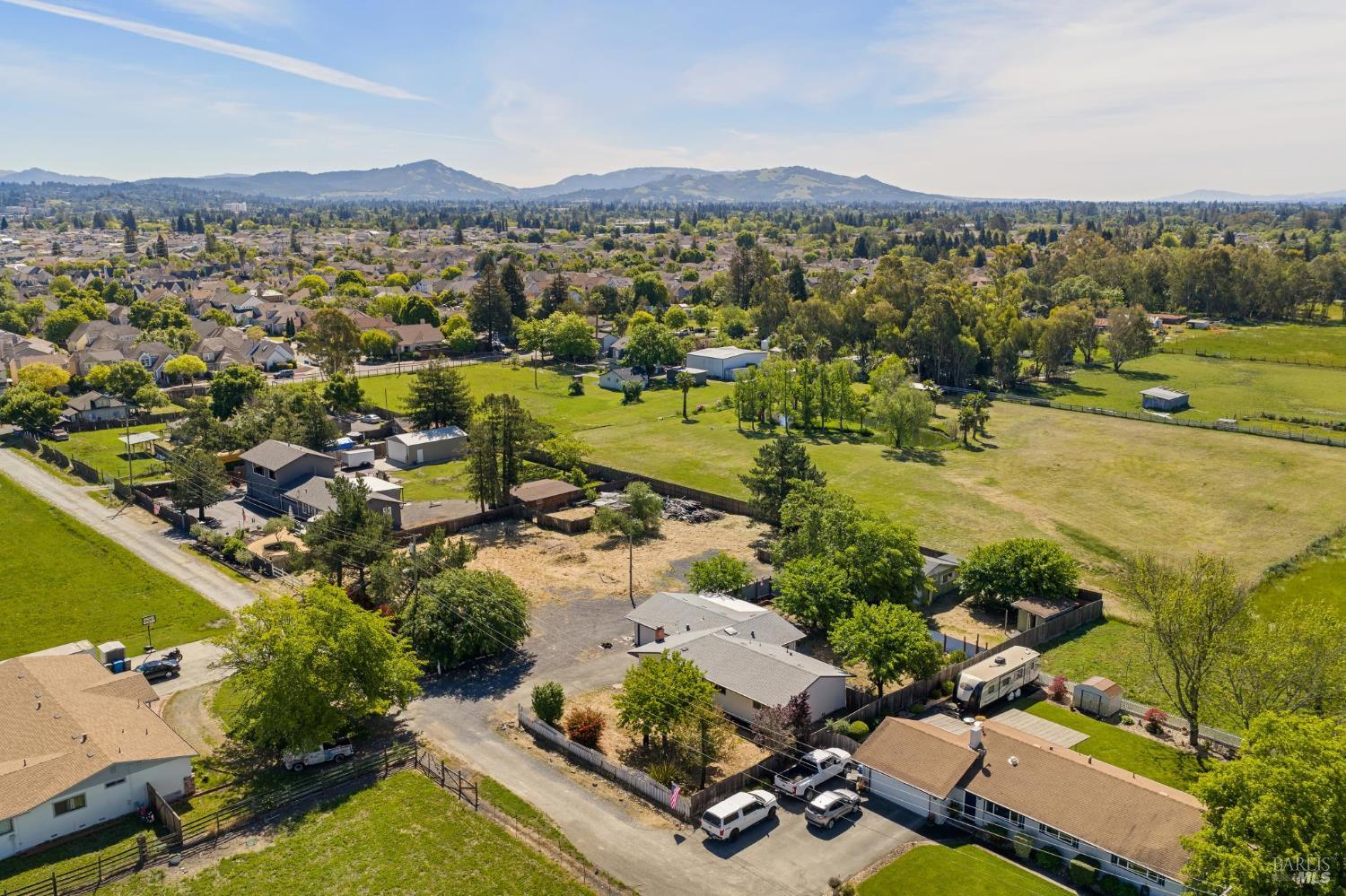 2295 Francisco Avenue, Unit 1 Santa Rosa, CA 95403 - Photo 56 of 65 an aerial view of residential houses with outdoor space