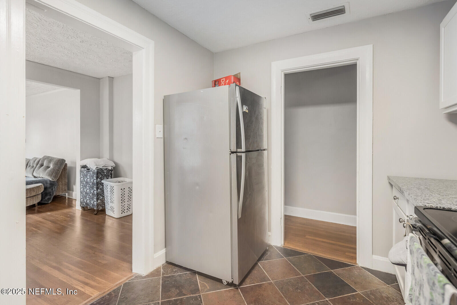 3668 Valencia Road Jacksonville, FL 32205 - Photo 18 of 23 a kitchen with stainless steel appliances granite countertop a refrigerator and a sink