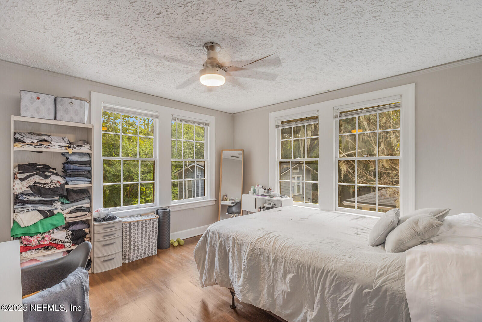 3668 Valencia Road Jacksonville, FL 32205 - Photo 20 of 23 a bedroom with a bed and a large window