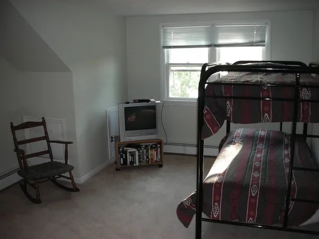 a view of livingroom with furniture and windows