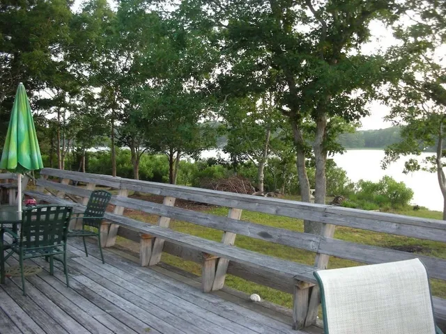 a view of outdoor sitting area with chairs