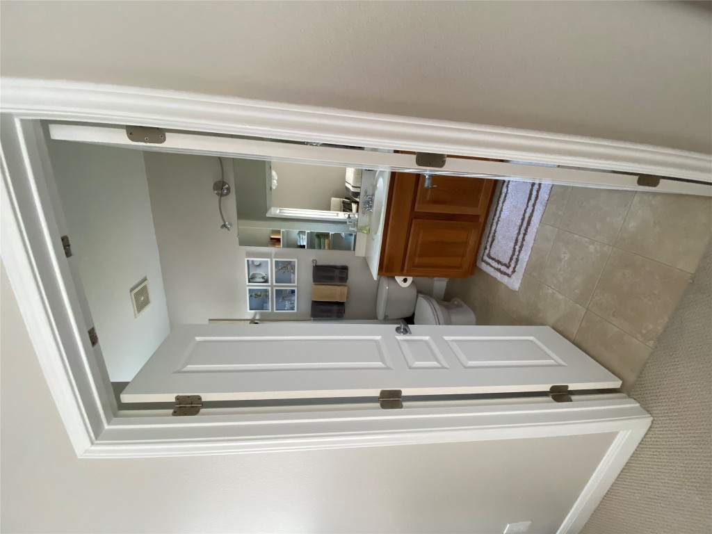 3406 Menchaca Road, Unit 24 Austin, TX 78704 - Photo 11 of 14 a room with a washer and dryer