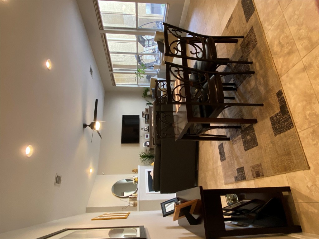 3406 Menchaca Road, Unit 24 Austin, TX 78704 - Photo 12 of 14 a view of a dining room with furniture