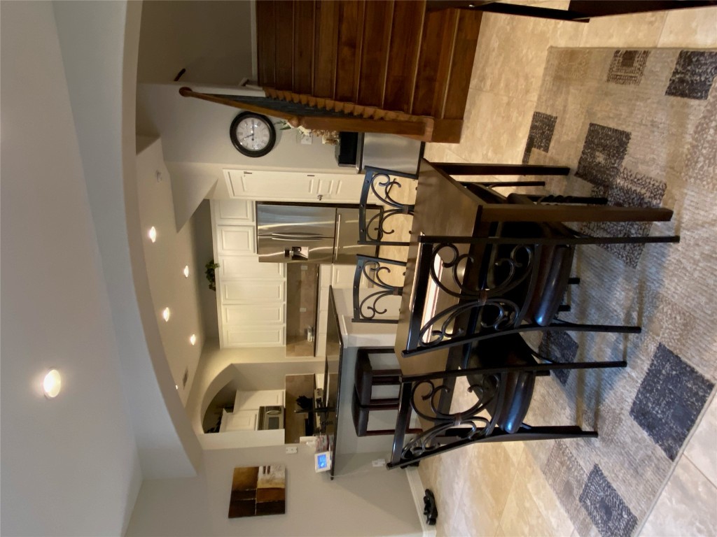 3406 Menchaca Road, Unit 24 Austin, TX 78704 - Photo 6 of 14 a view of a dining room with furniture