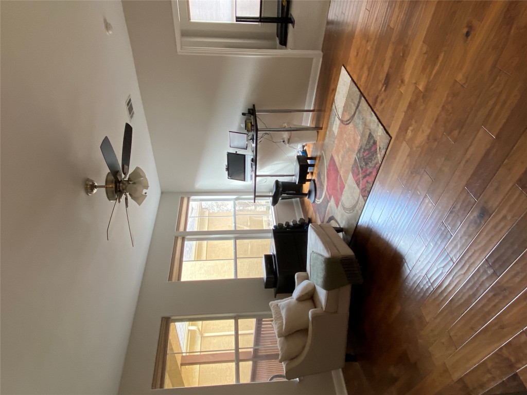3406 Menchaca Road, Unit 24 Austin, TX 78704 - Photo 8 of 14 a living room with furniture and a large window