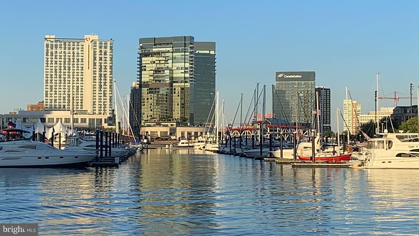 100 Harborview Drive, Unit 507 Baltimore, MD 21230 - Photo 1 of 28 a view of a ocean with tall building