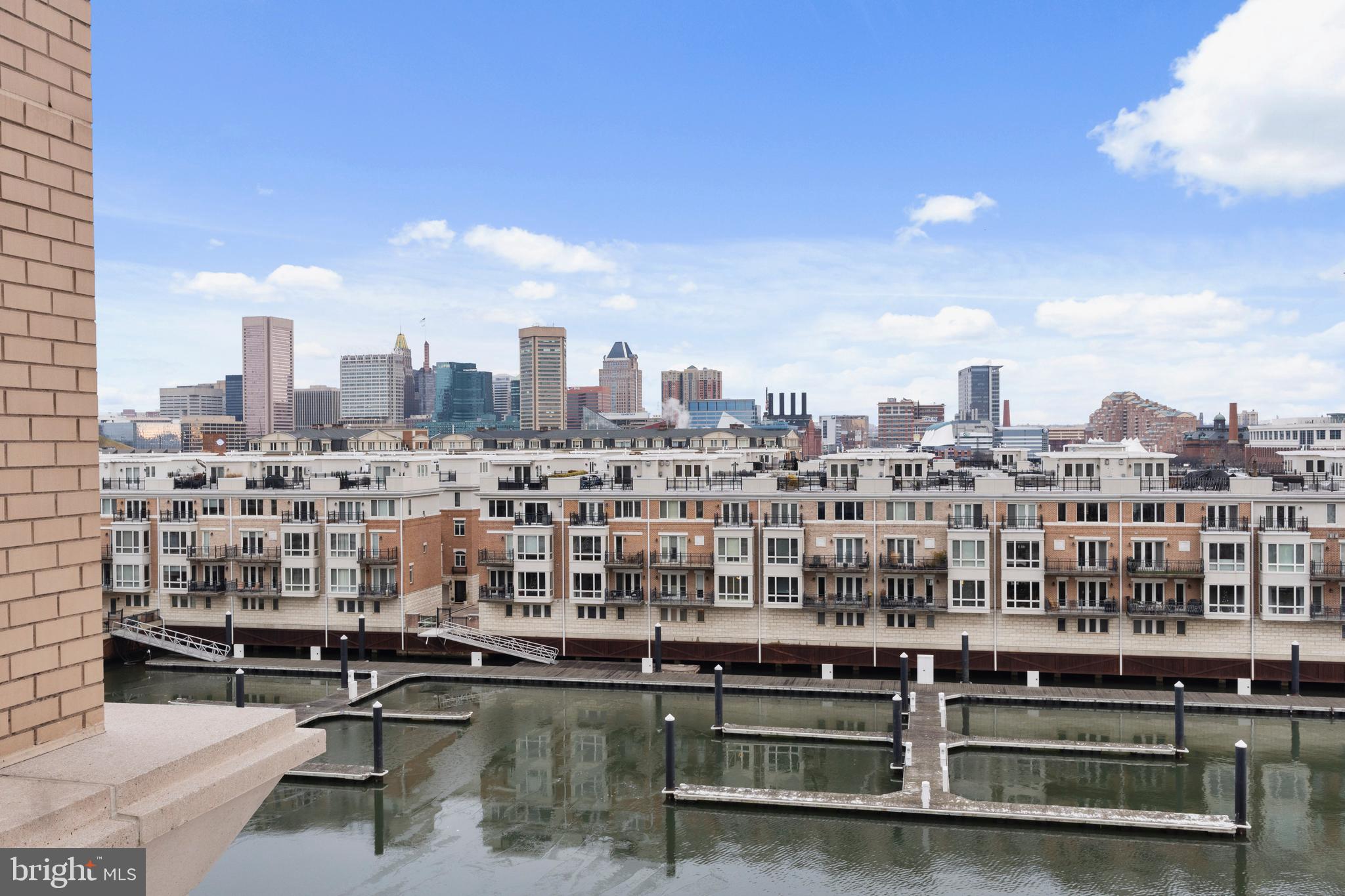 100 Harborview Drive, Unit 507 Baltimore, MD 21230 - Photo 14 of 28 a view of a city with tall buildings